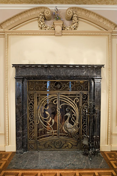 Bronze peacock fire screen and iron fireplace tools
